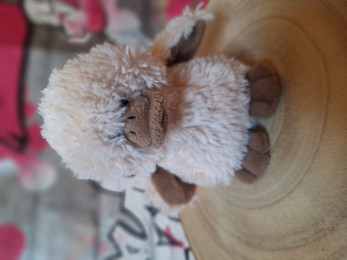 Peluche doudou petit canard duveteux mon poussin beige et marron