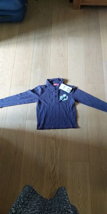 Polo manches longues NEUF