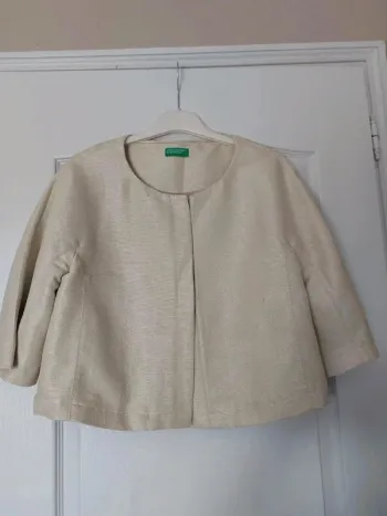 Boléro couleur champagne Benetton valeur 90€