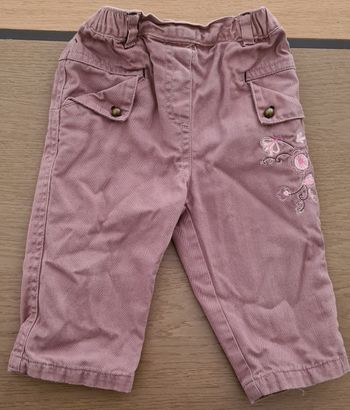 Pantalon rose foncé doublé  en parfait état 12 mois