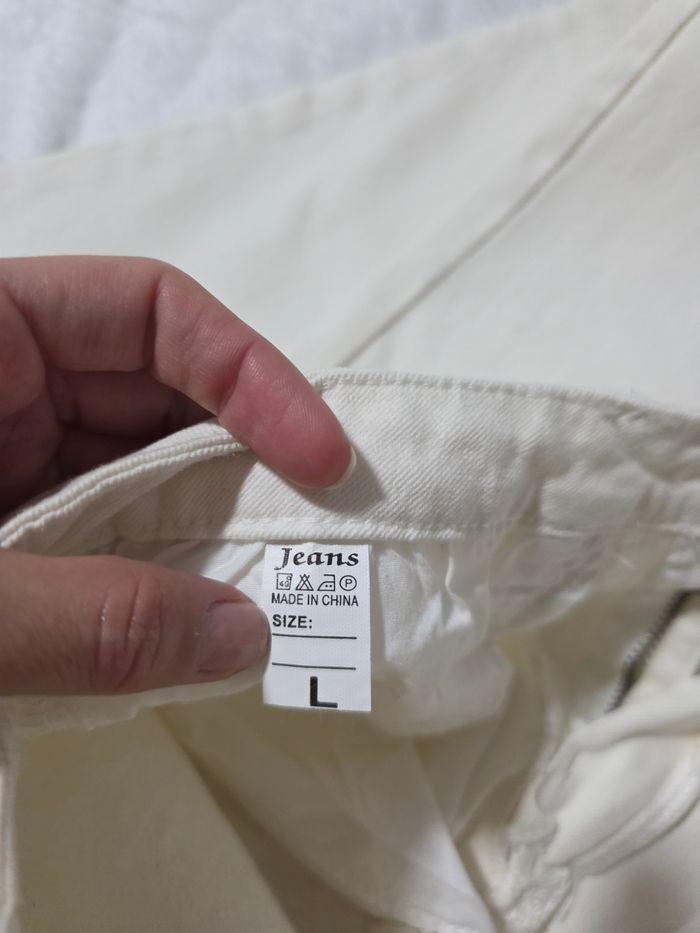 Jean patte d’éléphant blanc - photo numéro 10
