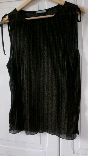 Haut noir avec brillant doré