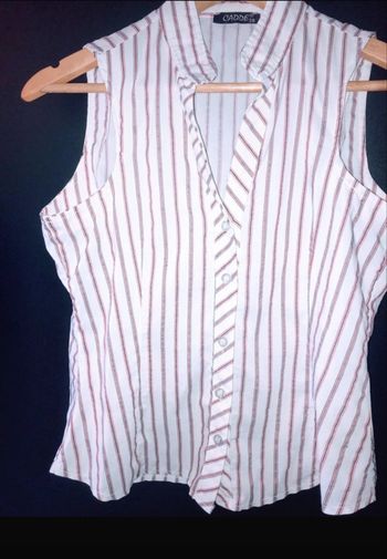 jolie chemisette sans manches taille petit 38