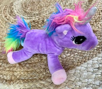 Peluche licorne violet bon état