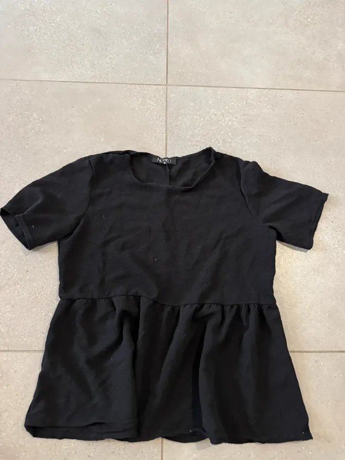 Haut noir Newco, taille M, très bon état