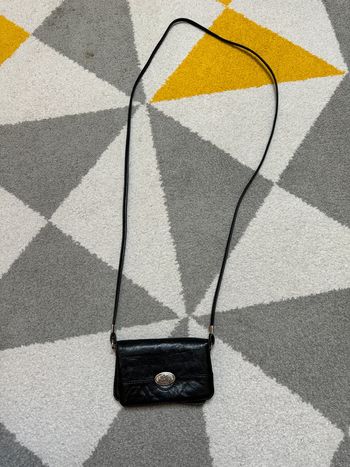 Pochette à bandoulière en cuir vintage