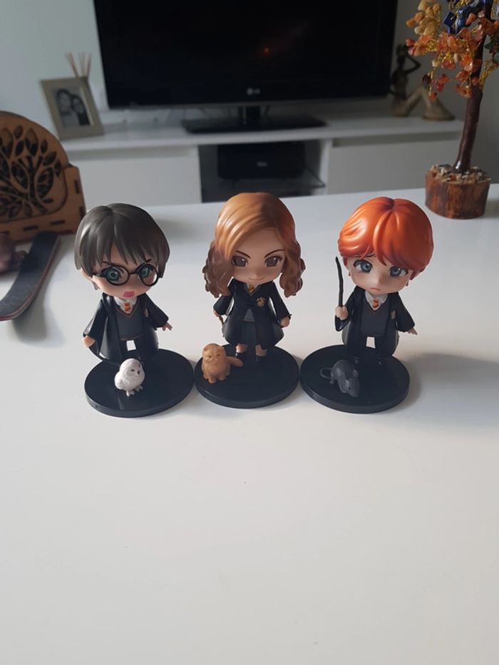 3 figurines Harry Potter avec leurs animaux