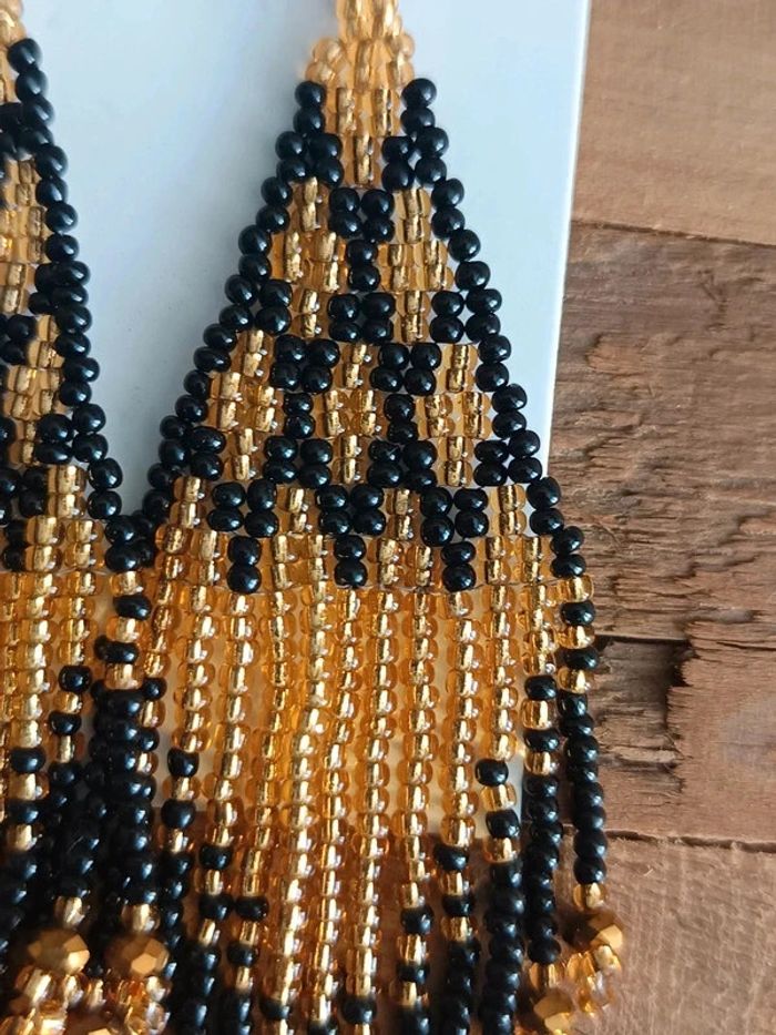 Boucles d'oreilles pendantes perles noires et doré - photo numéro 2