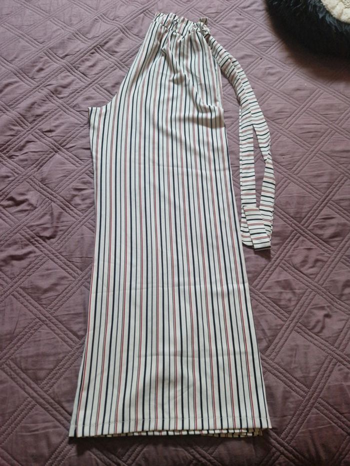 Pantalon large blanc avec des rayures rouge et marine