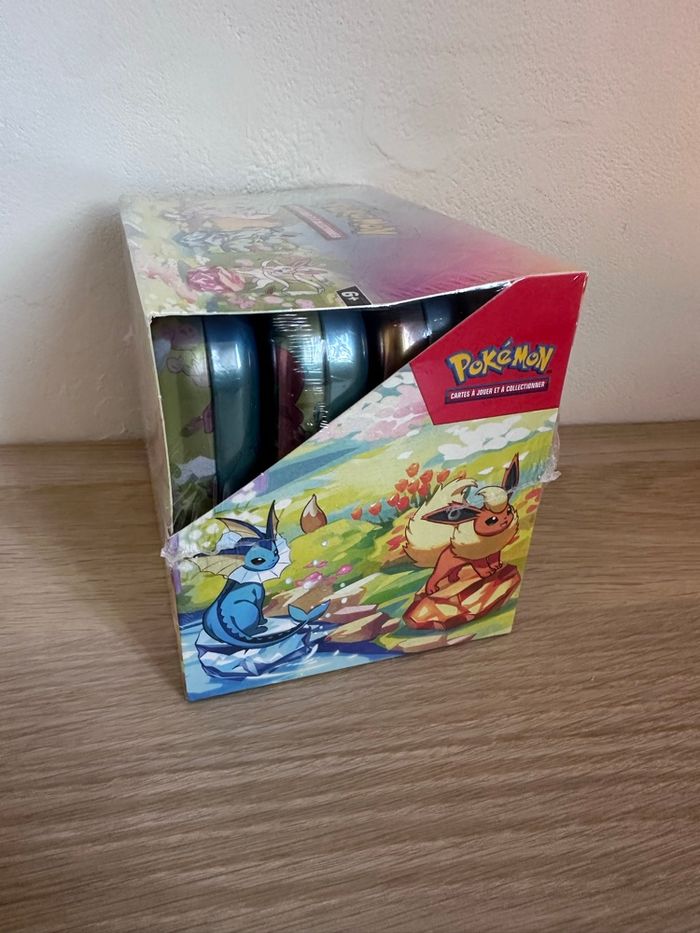 Display Pokémon mini tins Ev8.5 Évolutions Prismatiques scellée - photo numéro 4