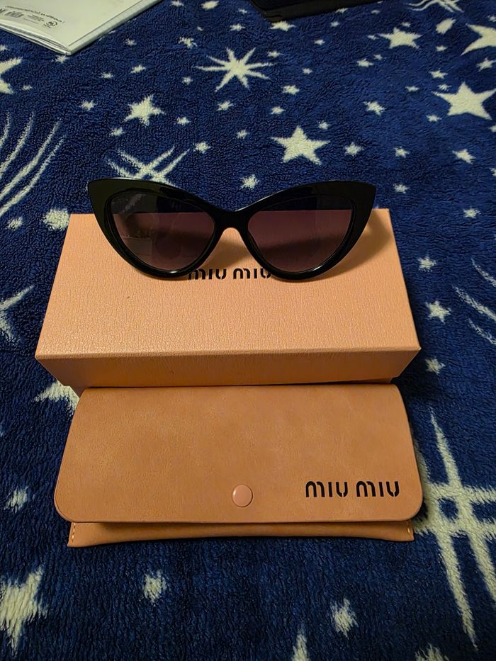Lunettes de soleil miu miu