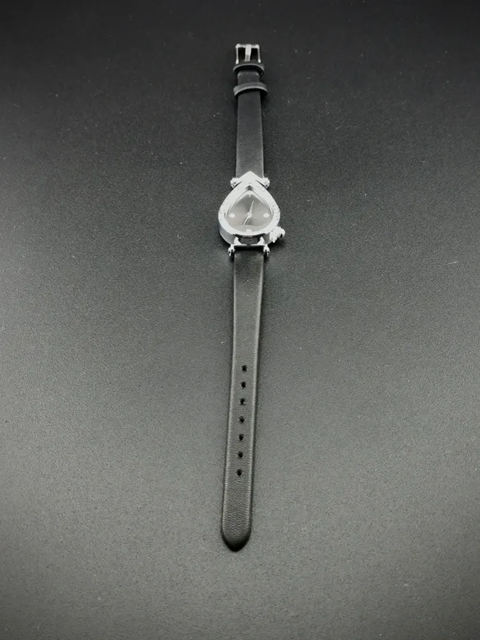 Montre originale noire, argentée, goutte d'eau - photo numéro 3