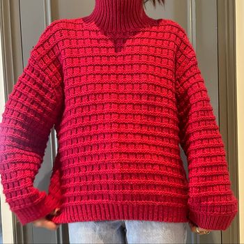 Pull col roulé