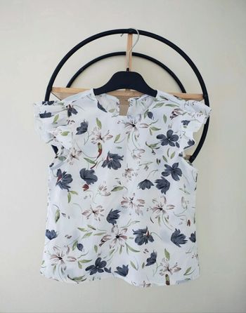 9 ans blouse été légère ( étiquette coupée)