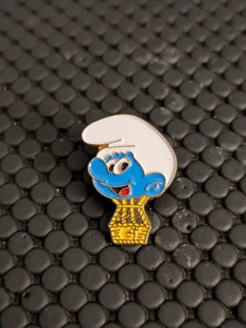 Pin's montgolfière Schtroumpfs Peyo 1991