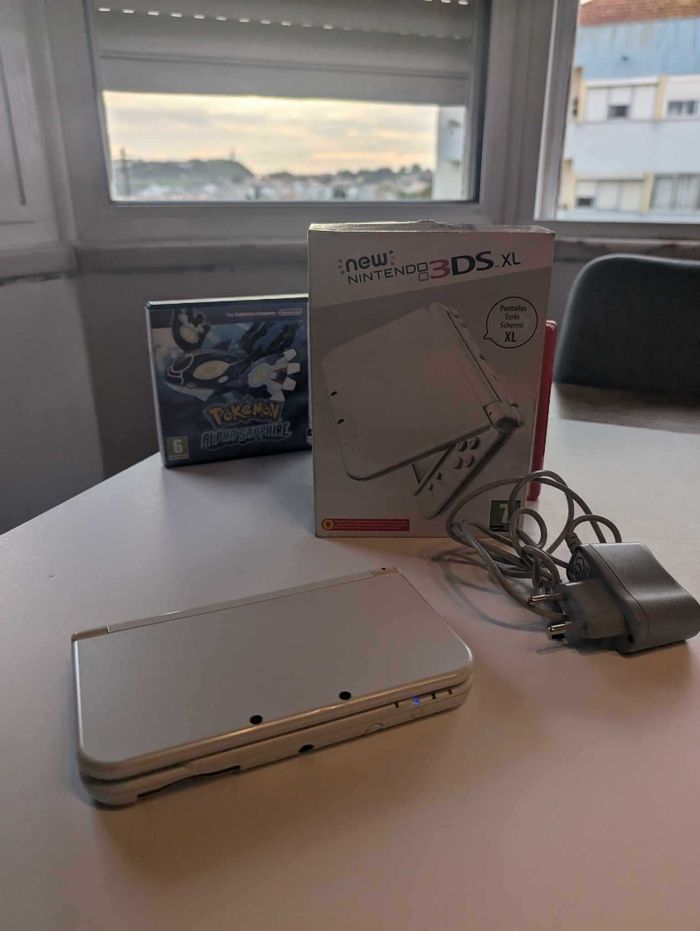 Nintendo 3DS XL blanche avec 2 jeux Pokémon ! - photo numéro 4