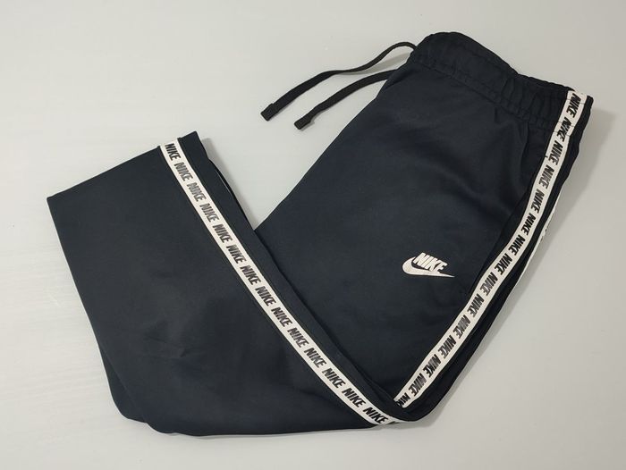 Vêtement vintage de marque Pantalon survêtement Nike noir bande blanche S #D84