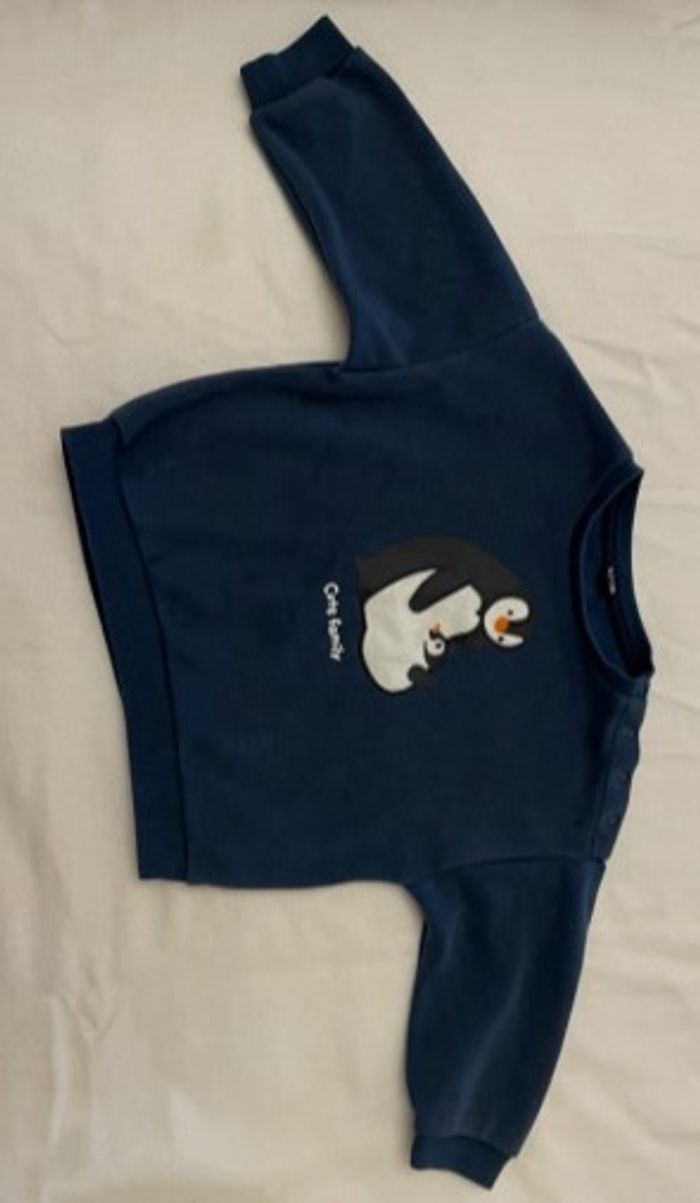 Pull manches longues boutons pression 24 m 86cm