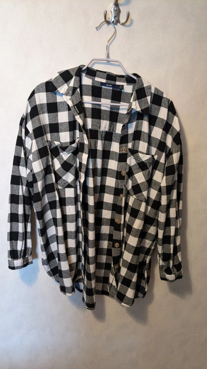 Chemise à carreaux chaude noire et blanche