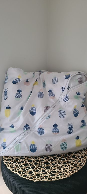 Duvet avec coussin et poche intégrés