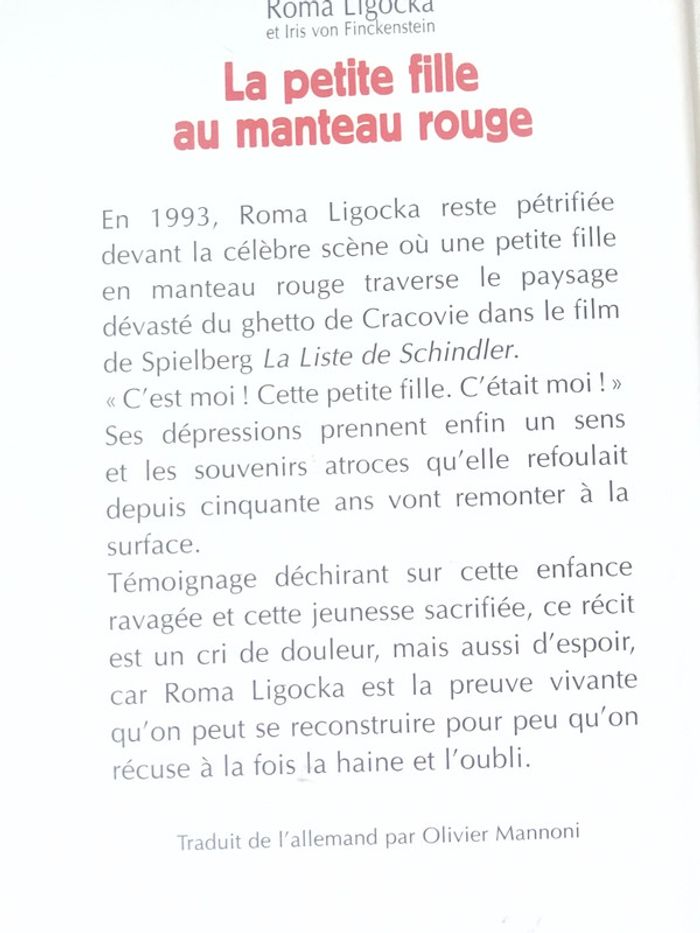 La petite fille au manteau rouge - photo numéro 2