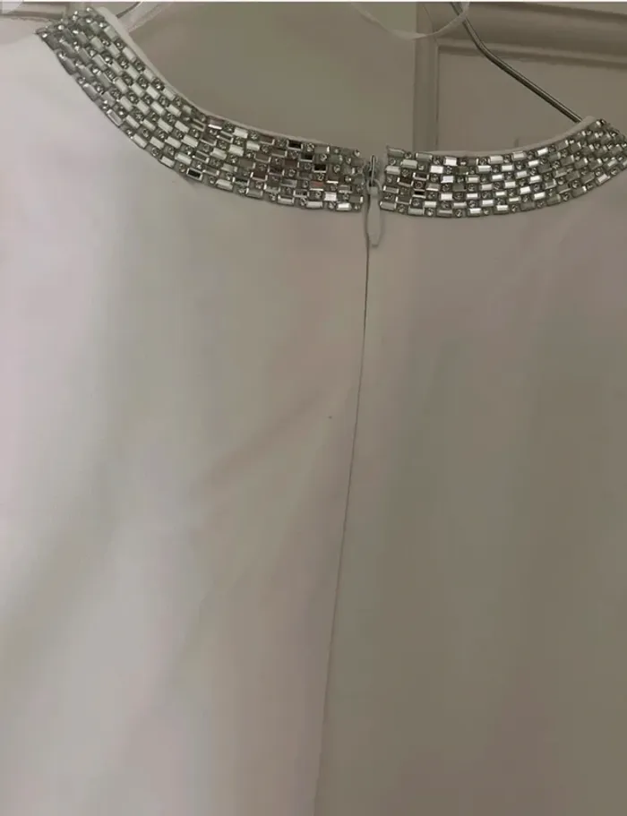Body blanc decolleté profond bijoux Zara T S neuf - photo numéro 3