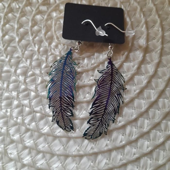 Paire de boucle d oreille plume