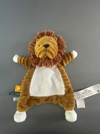 Doudou lion tape à l’œil TAO