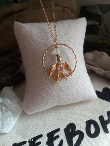 Collier oiseau avec zircon et pierre opaline