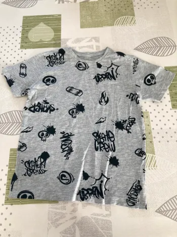 Tee-shirt primark gris en 9 ans (134 cm)