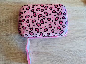 Pochette rose léopard filet mousse