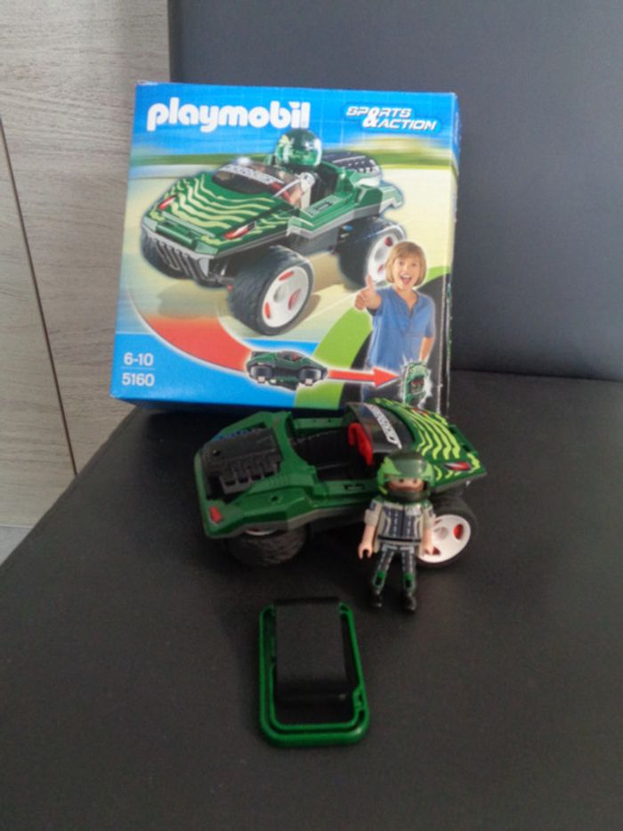 Voiture camouflage a emporter -sports et action - playmobil 5160