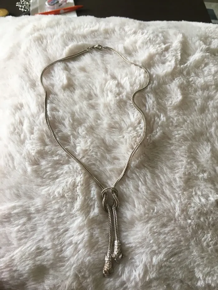 Collier tête de béliers