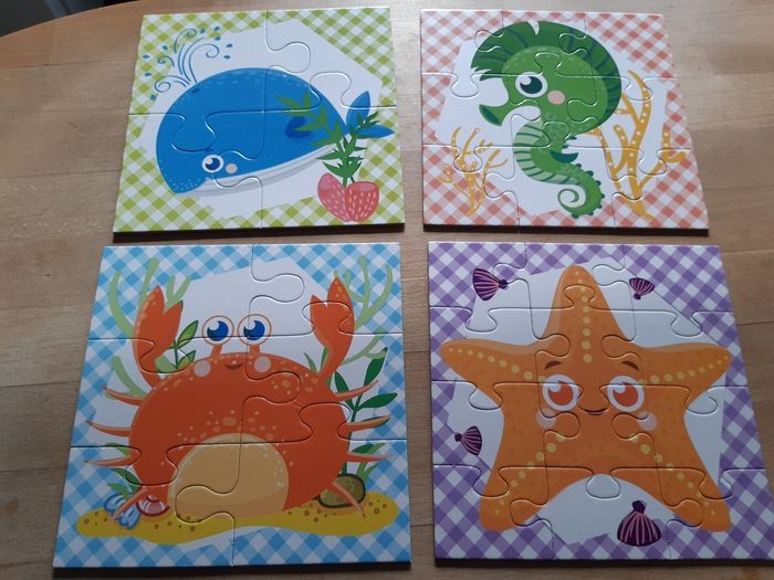 Boîte de 4 puzzles - photo numéro 2