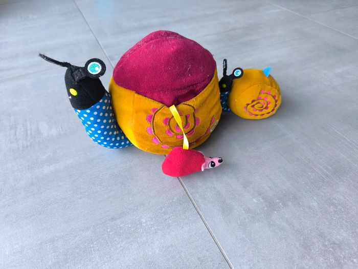Peluche multi activités Oops