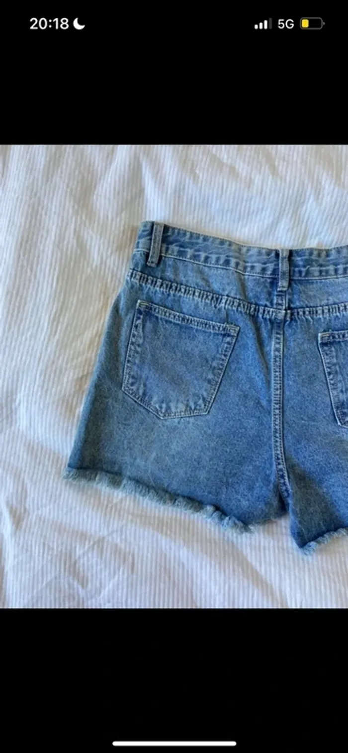 Short en jean troué - photo numéro 5