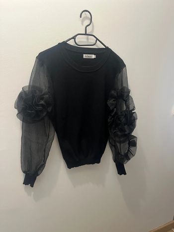 Pull noir original avec manches transparentes taille S/M