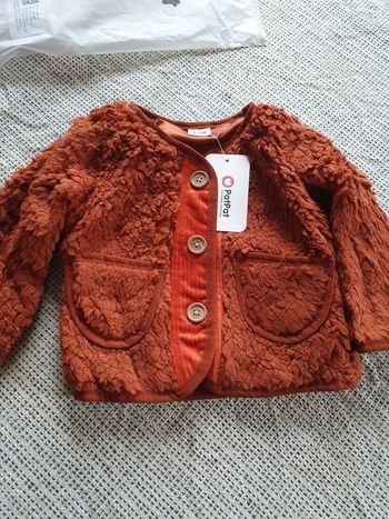 Veste fausse fourrure 9-12mois