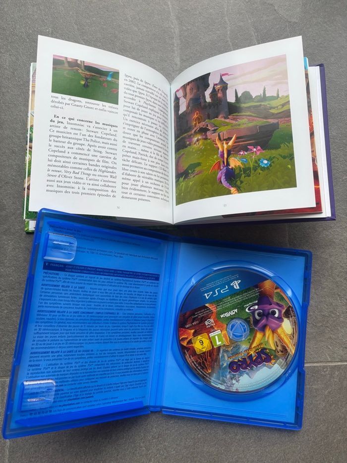 Jeu Spyro Reignited Trilogy PS4 + livre collector L’Histoire de Spyro - photo numéro 2