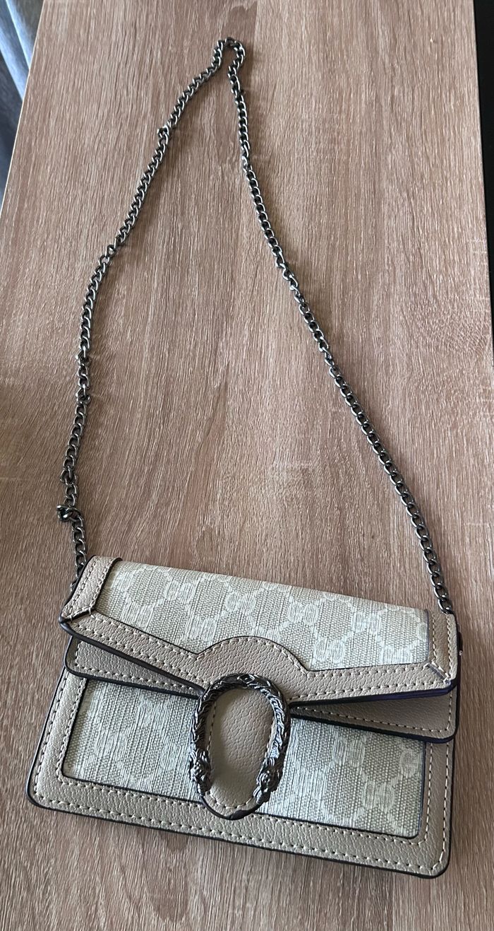 Sac beige bandouillere