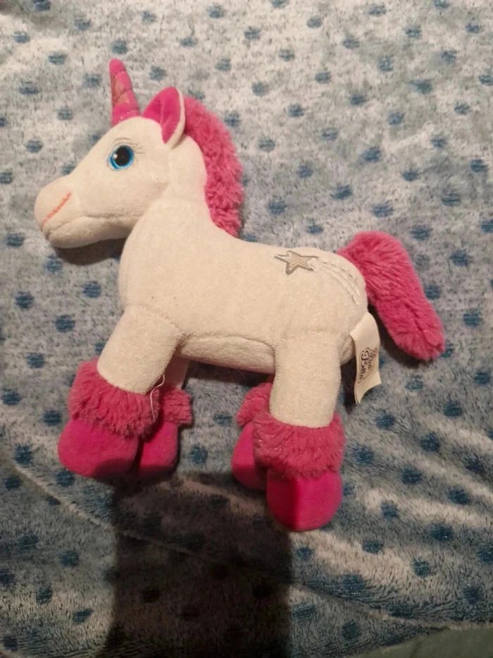 Peluche licorne blanche et rose sonore