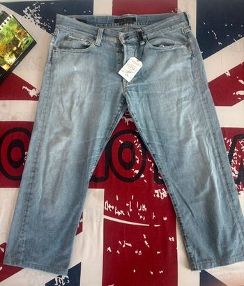 Jeans coupe courte à bouton Stone Island taille 46/47 bleu clair