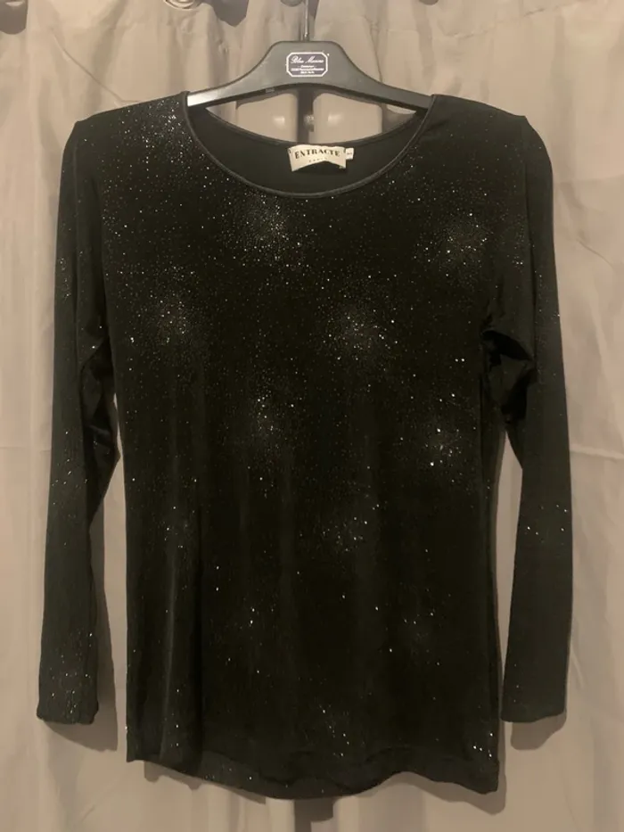 pull noir avec paillettes