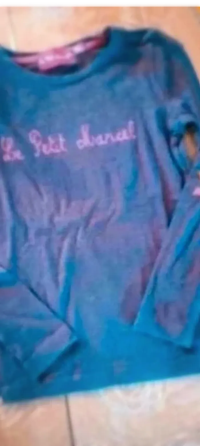 T-shirt 8  ans bon  état  le  petit  Marcel