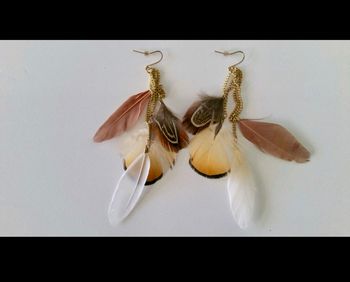 parure de boucles d'oreilles ASOS  multi chaînes plumes