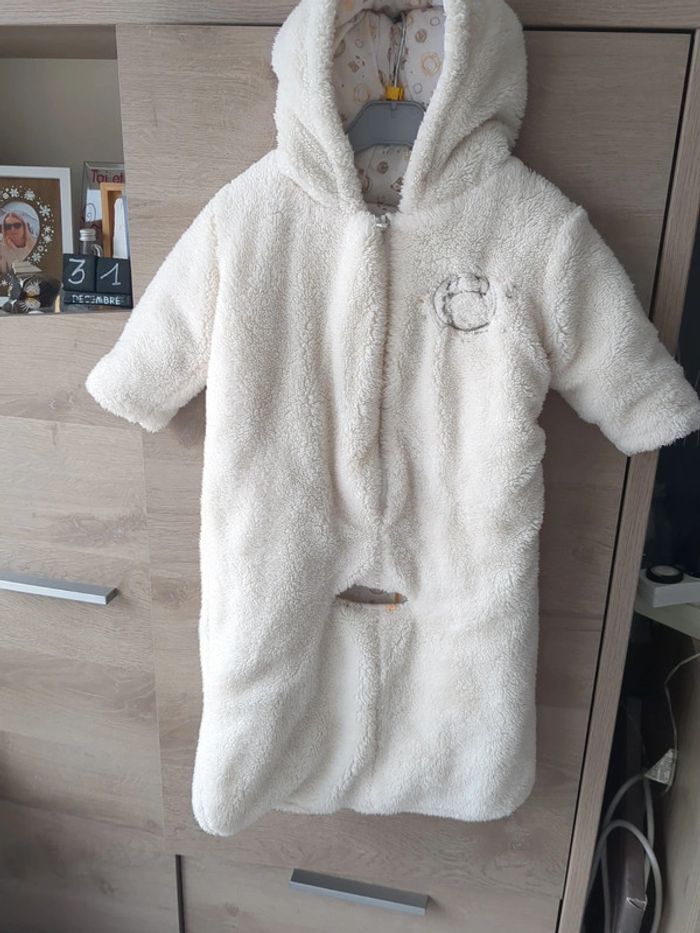 Manteau combinaison avec ouverture ceinture