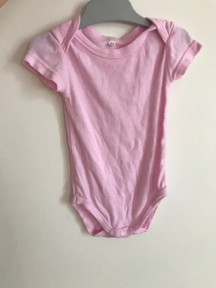 Body 6 mois rose pâle manches courtes