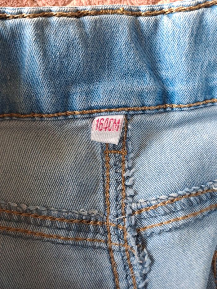 T-shirt fille bleu clair délavé tbe 14 ans - photo numéro 6