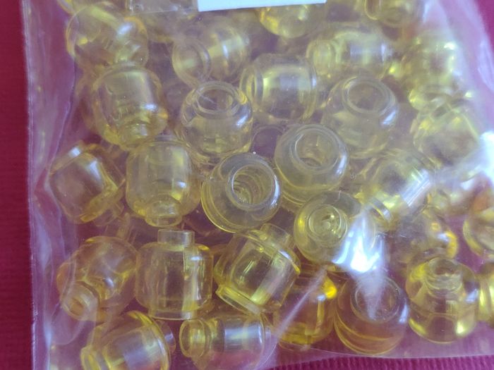 Lot 100 pièces têtes jaune transparent Lego - en parfait état - vrai Lego - photo numéro 5