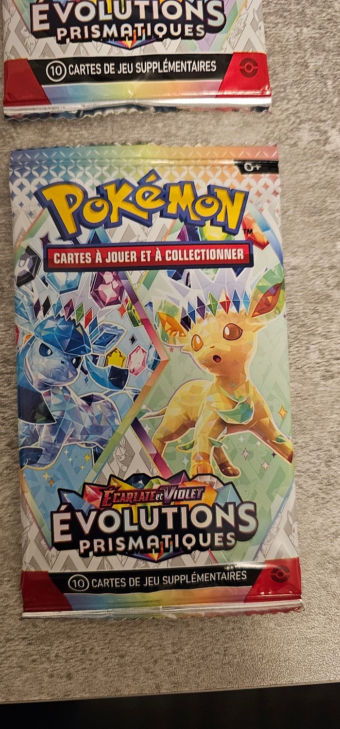 Lot de 4 blisters de 10 cartes Pokémon Évolution Prismatique - photo numéro 3